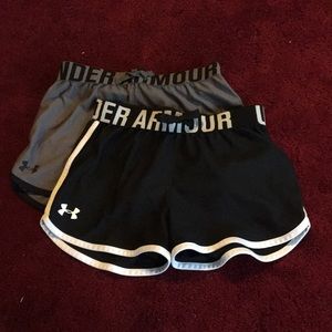 2 pairs Under Armour heat gear shorts- Youth Med